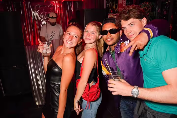 A lively group enjoying the vibrant nightlife on the Pub Crawl Madrid by Mad Party Crew, showcasing the city's dynamic social scene.