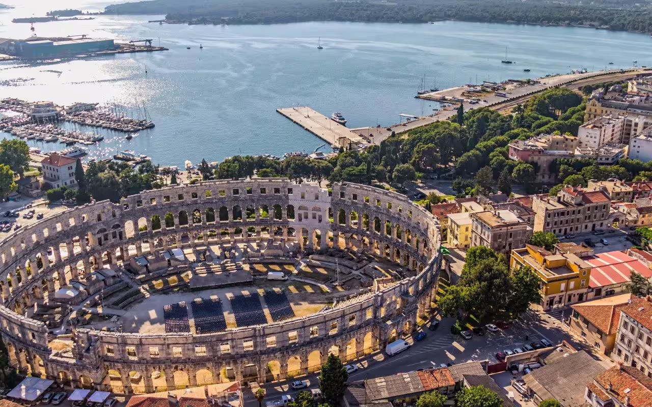 Aerial view of Pula Arena by the Adriatic harbor, Istria, Croatia on an 8-day Slovenia and Istria road trip