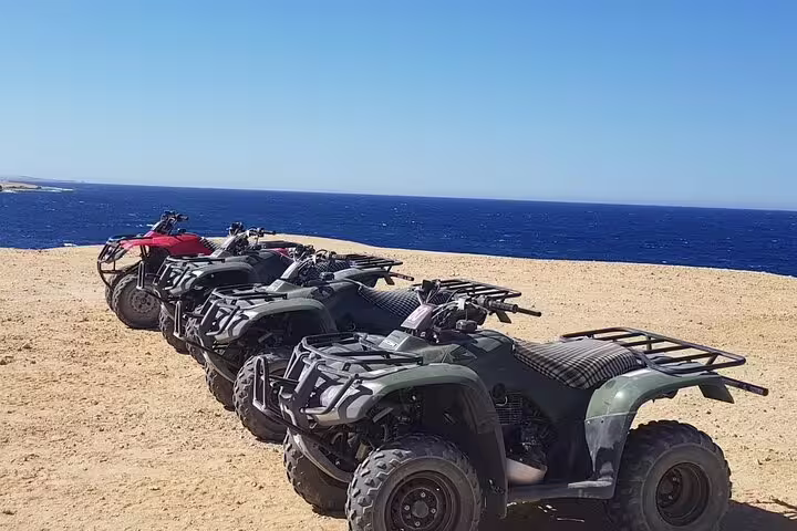 Parked quad bikes on Makadi Bay coastal desert overlooking the Red Sea, Sea Side Private Quad tour