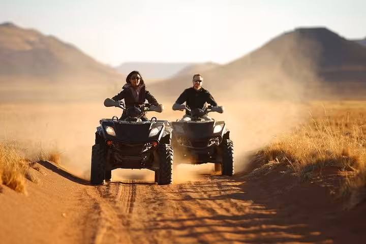 Quad biking through dunes at golden sunset, 3-hour desert safari from Hurghada, El Gouna, Makadi Bay
