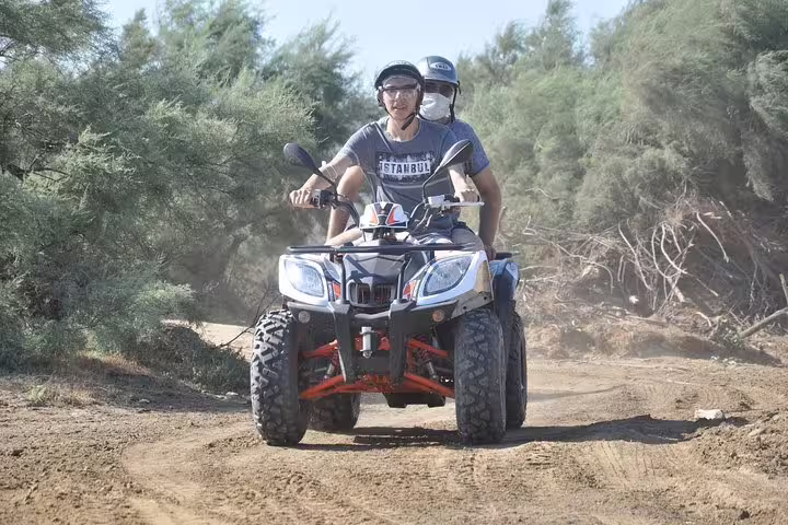 Cruise guests enjoy thrilling quad riding adventure through scenic trails near Kusadasi Port.