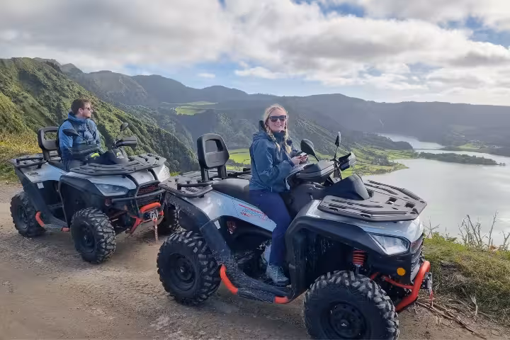 Riders on ATVs at Sete Cidades viewpoint with lagoon panorama, half-day quad tour adventure in São Miguel Azores