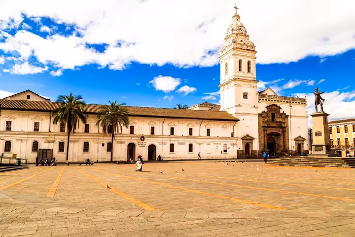 Santo Domingo Plaza and Church in Quito's historic center with white colonial architecture and bell tower
