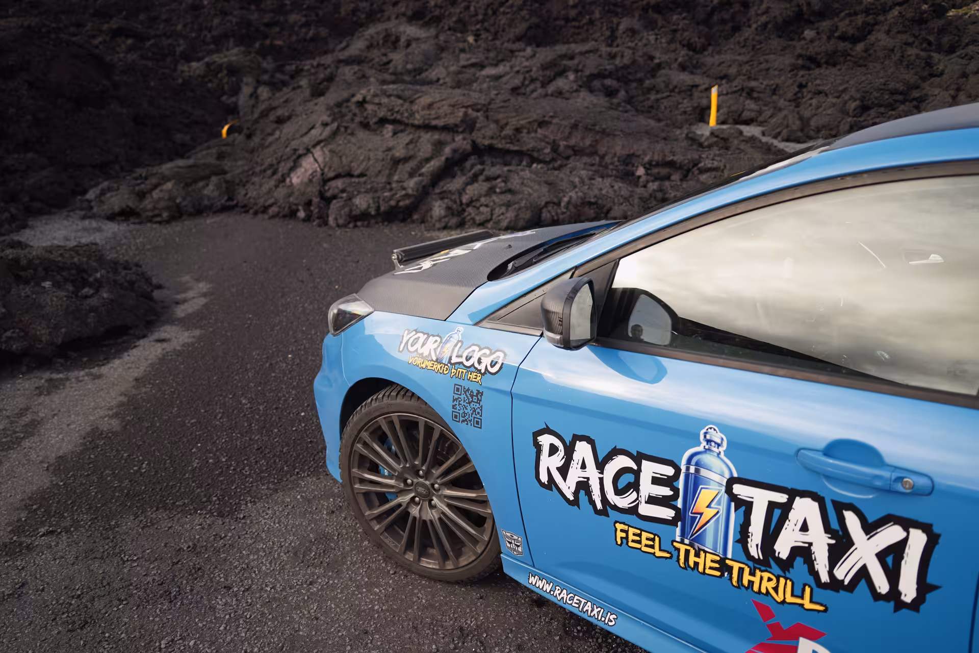 Race taxi beside lava fields on Iceland drive, Hvalfjörður Scenic Fjord Blast tour with optional Hvammsvík baths