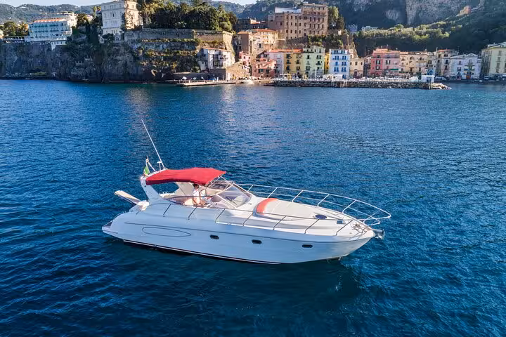 Raffaelli Shamal 40 yacht anchored near Sorrento's coast, offering a serene setting for a Capri luxury tour.