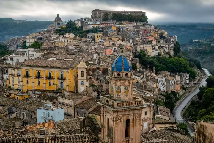Ragusa Ibla skyline with blue dome and baroque streets, scenic view on Noto Ragusa Modica excursion from Siracusa