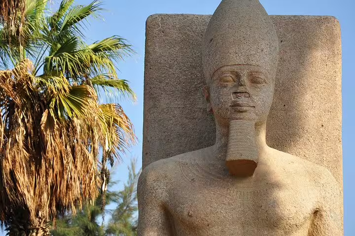 Granite statue of Ramses II at Memphis open-air museum, key stop on Sakkara and Memphis tour from Cairo