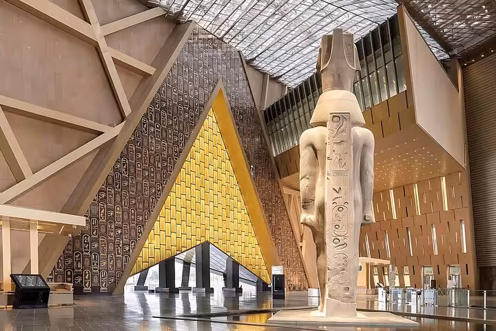 Back view of Ramses II statue at the Grand Egyptian Museum Cairo, part of Hurghada to Cairo museum trip