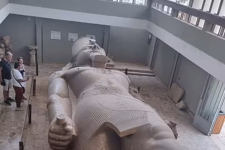 Colossal statue of Ramses II at the Memphis open-air museum on a Giza Pyramids and Saqqara private tour