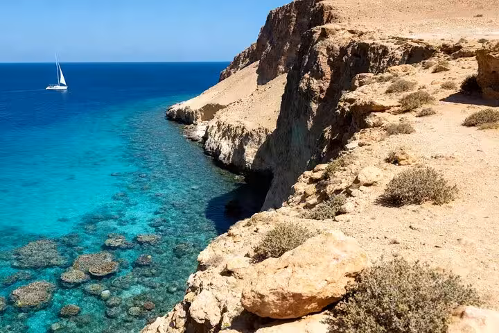 Ras Mohammed National Park coastal cliffs and coral reef waters, half-day bus tour from Sharm El Sheikh