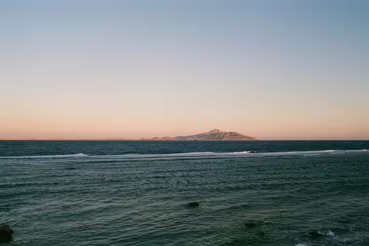 Red Sea horizon near Satayh Dolphin Reef at sunset, scenic view before snorkeling boat trip from Marsa Alam