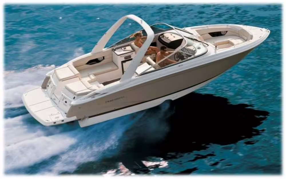 Luxurious Regal 2700 gliding on clear blue waters, offering premium boating experience for adventure seekers.