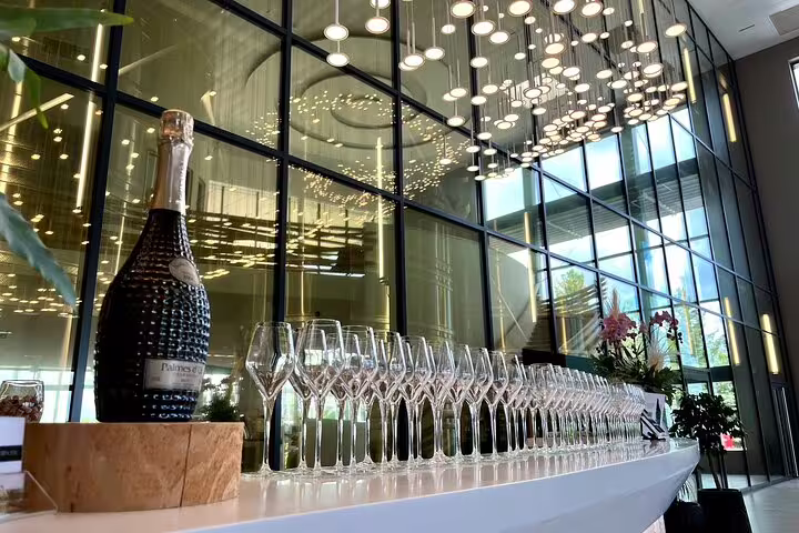 Champagne house tasting setup in Reims with flutes lined up, perfect for a Paris day trip tour