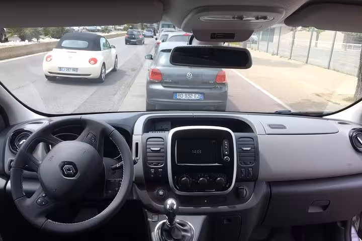 Renault Trafic interior dashboard view for private transfer Marseille to Montpellier, comfortable door-to-door ride