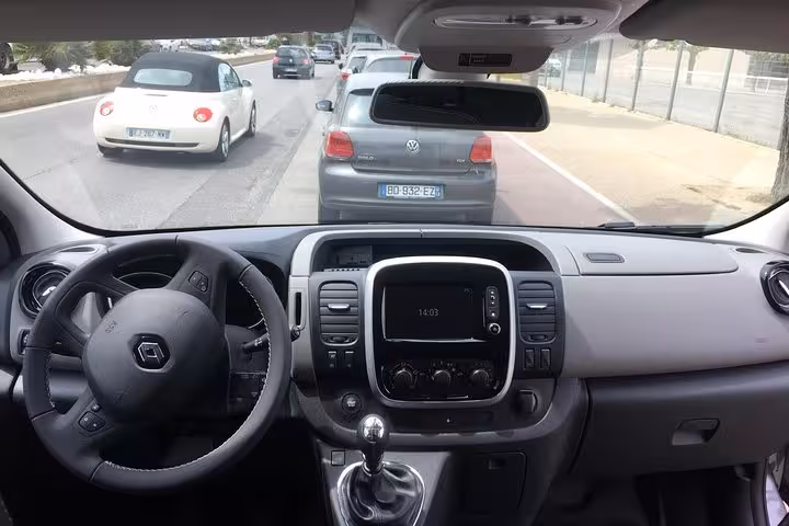 Renault van interior dashboard view for private transfer Marseille to Arles, comfortable air-conditioned ride