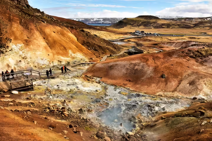 Steaming geothermal hot springs and colorful volcanic landscape on Reykjanes Peninsula, Iceland