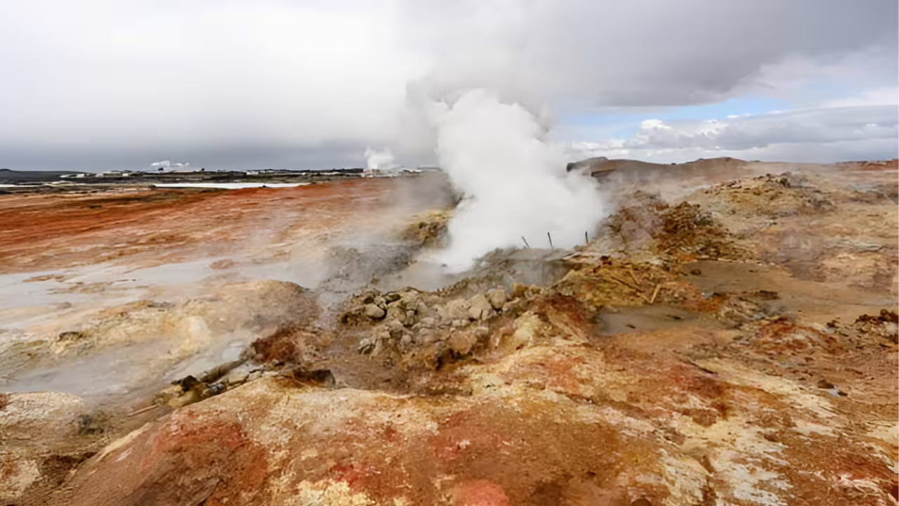 Steaming geothermal vents with colorful mineral-stained earth on the Reykjanes Peninsula, Iceland