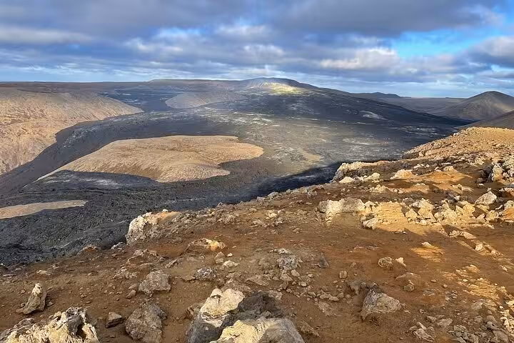 Vast lava fields and volcanic landscape on the Reykjanes Peninsula, Iceland, under a cloudy sky