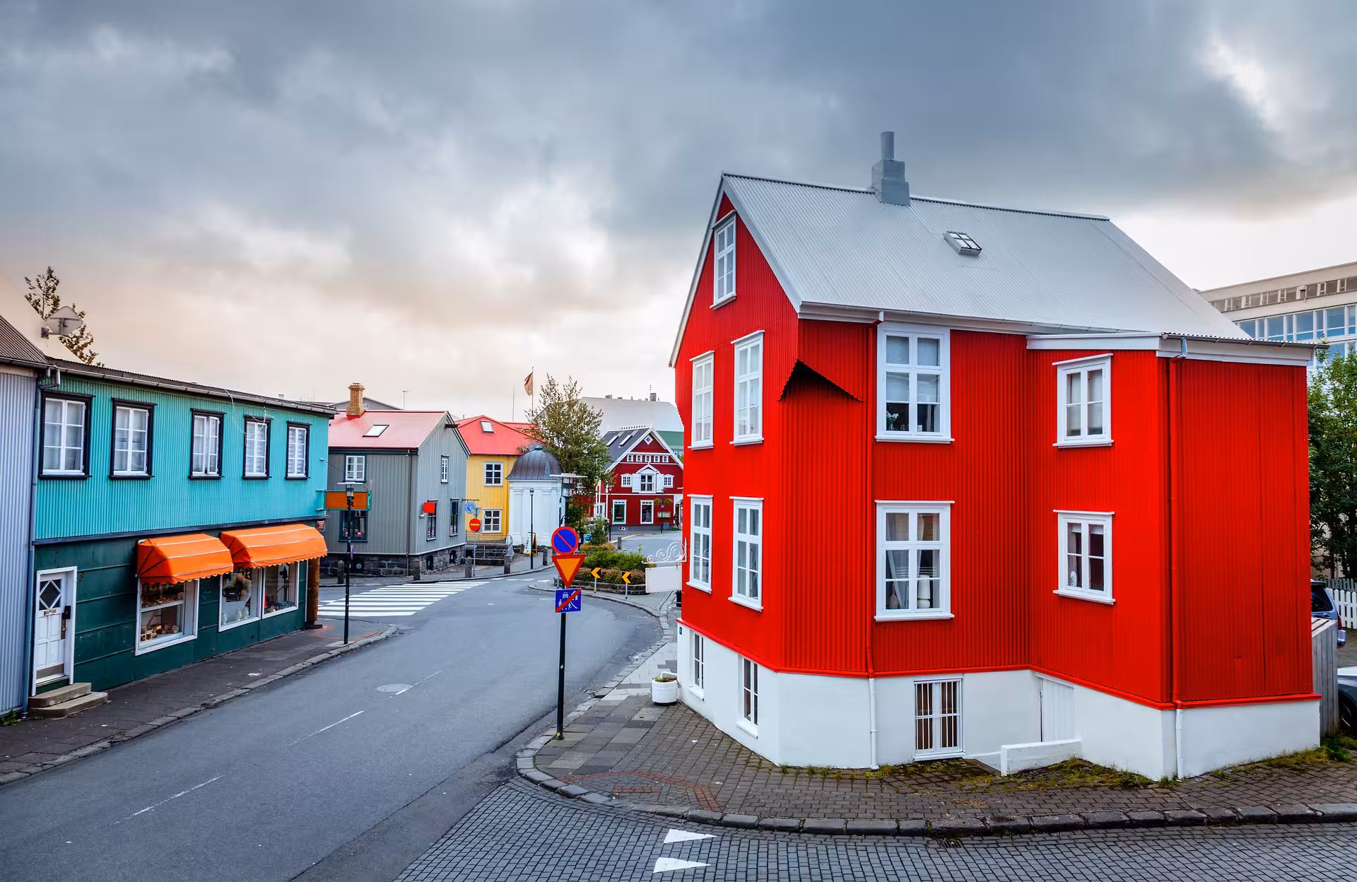 Colorful houses line a charming street in Reykjavik, Iceland, perfect for exploring on a 5-day small group tour.