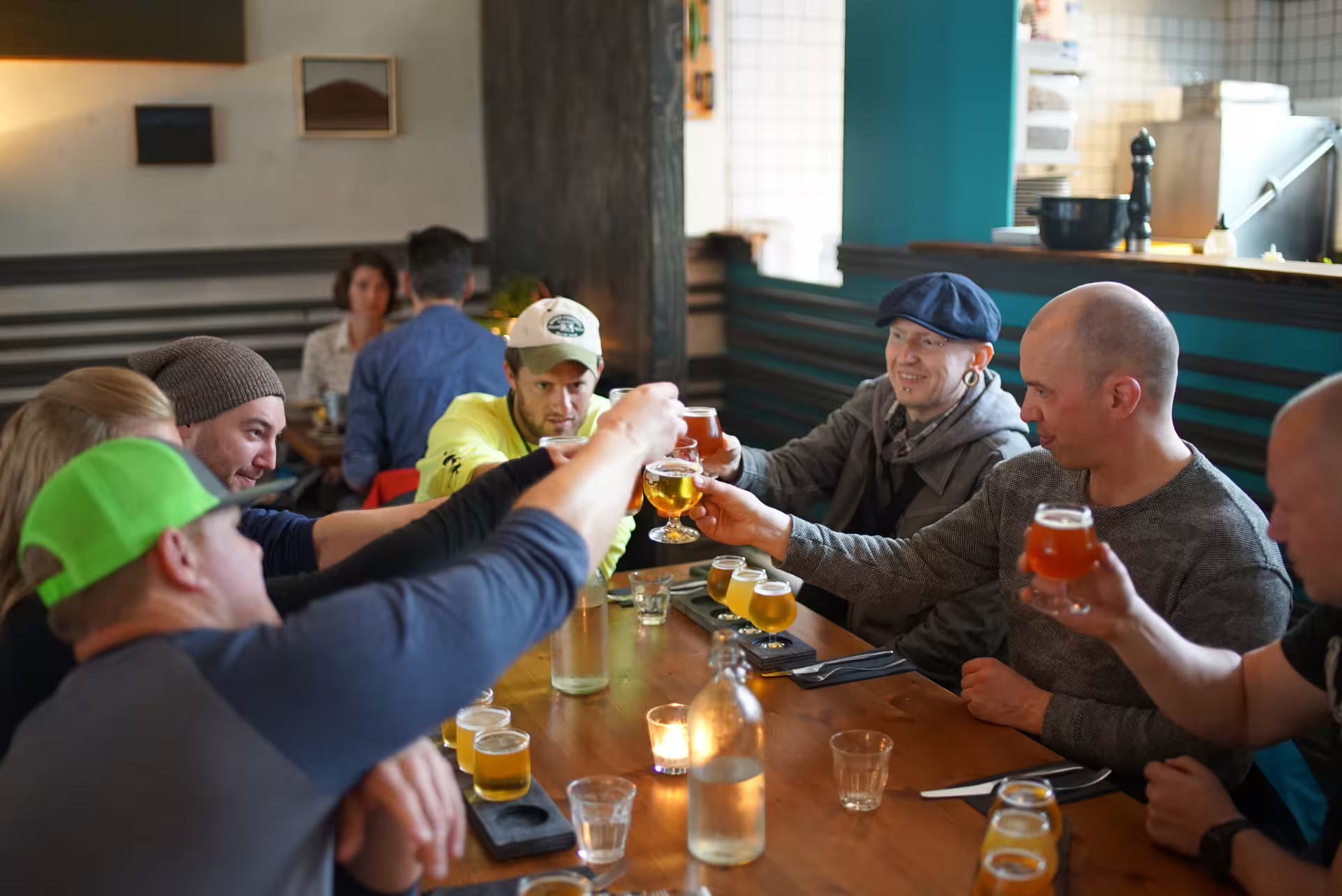A group of travellers performing a "cheers" gesture together.
