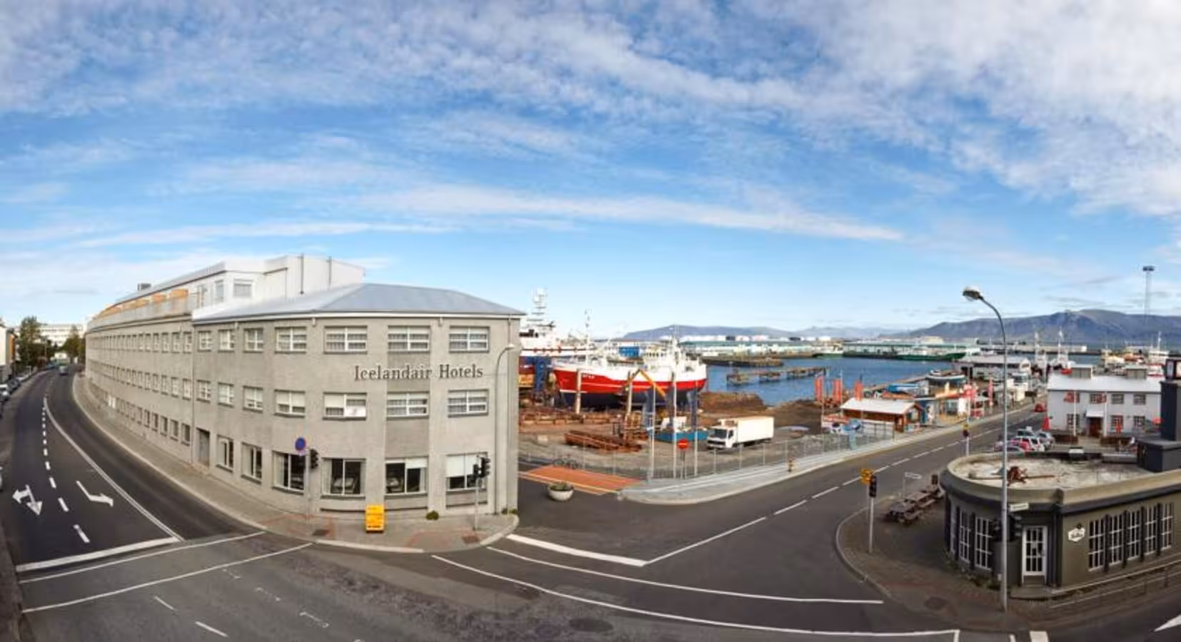 Scenic view of Reykjavik harbor and local architecture, a cultural highlight on the Iceland Winter Knitting Tour.