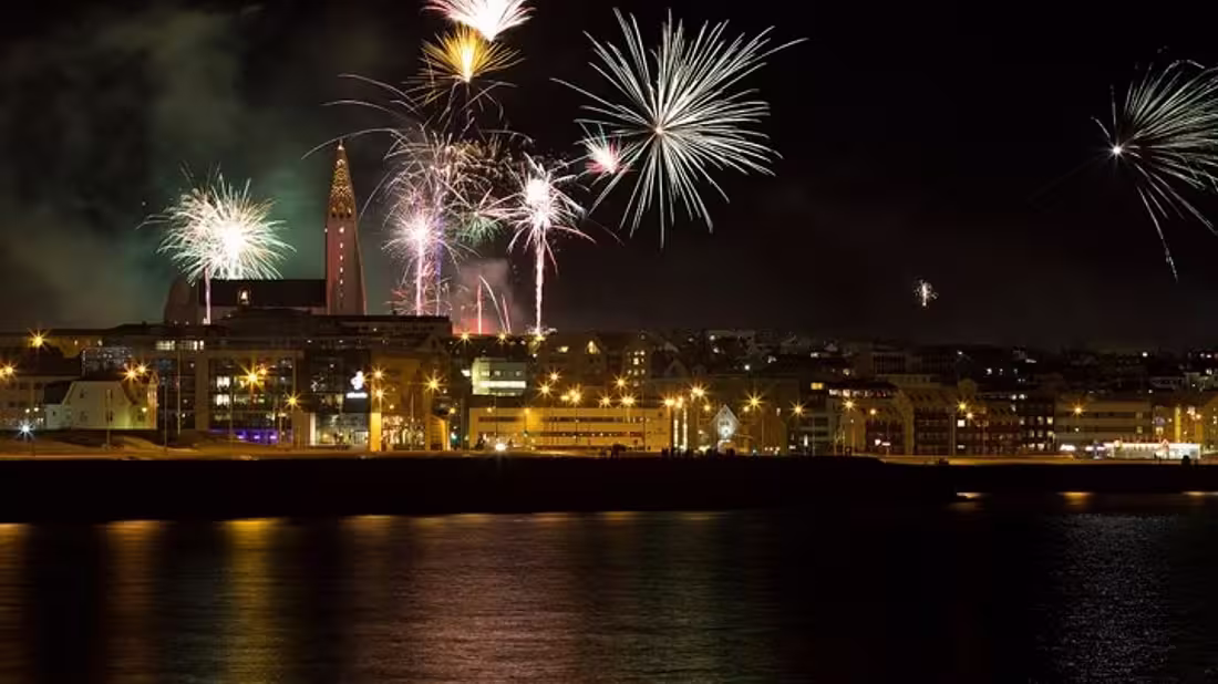 Fireworks in the night's sky above Reykjavik