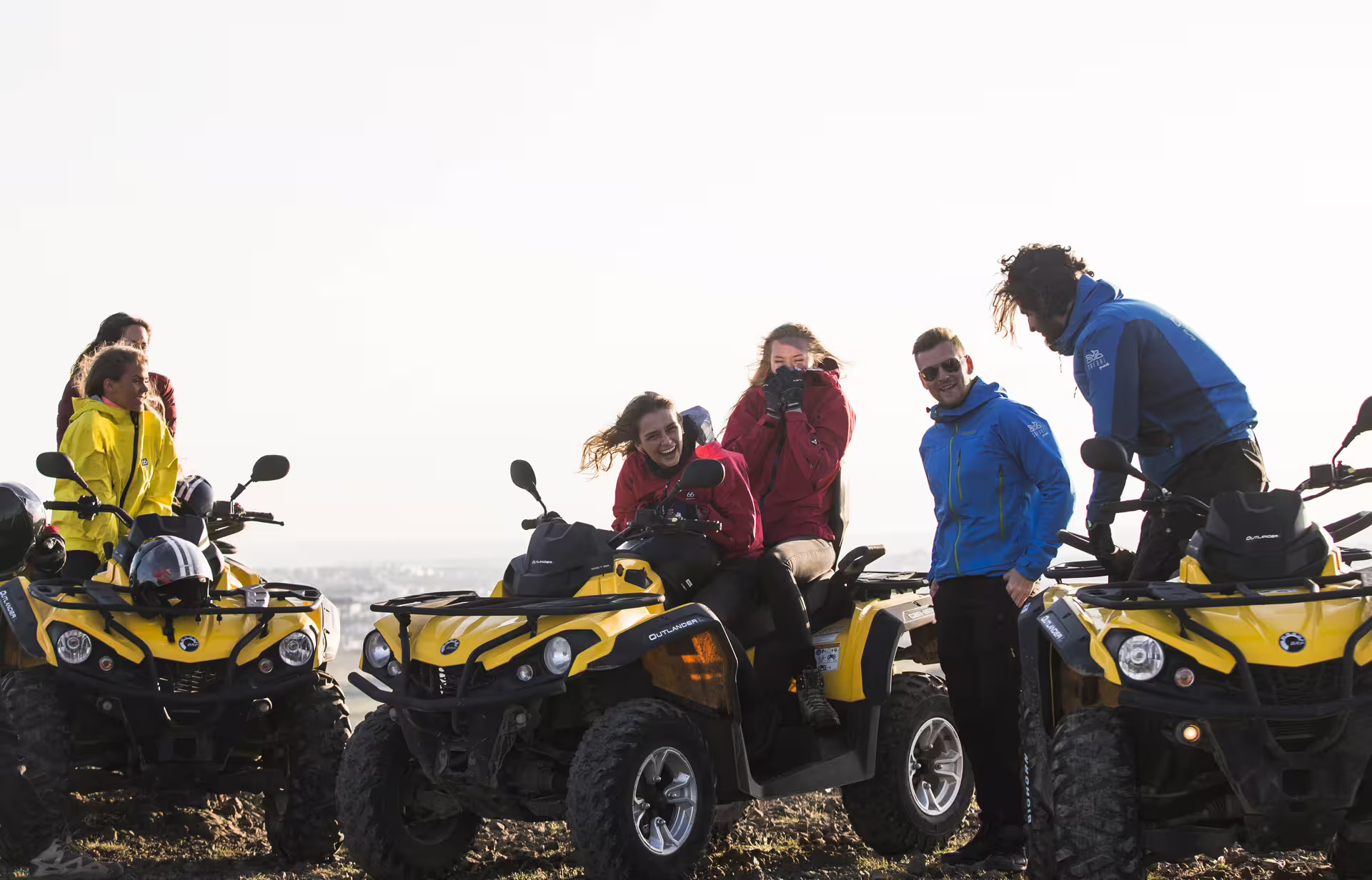 Group enjoying an exhilarating ATV adventure on Reykjavik peak, capturing scenic views and unforgettable outdoor experiences in Iceland.