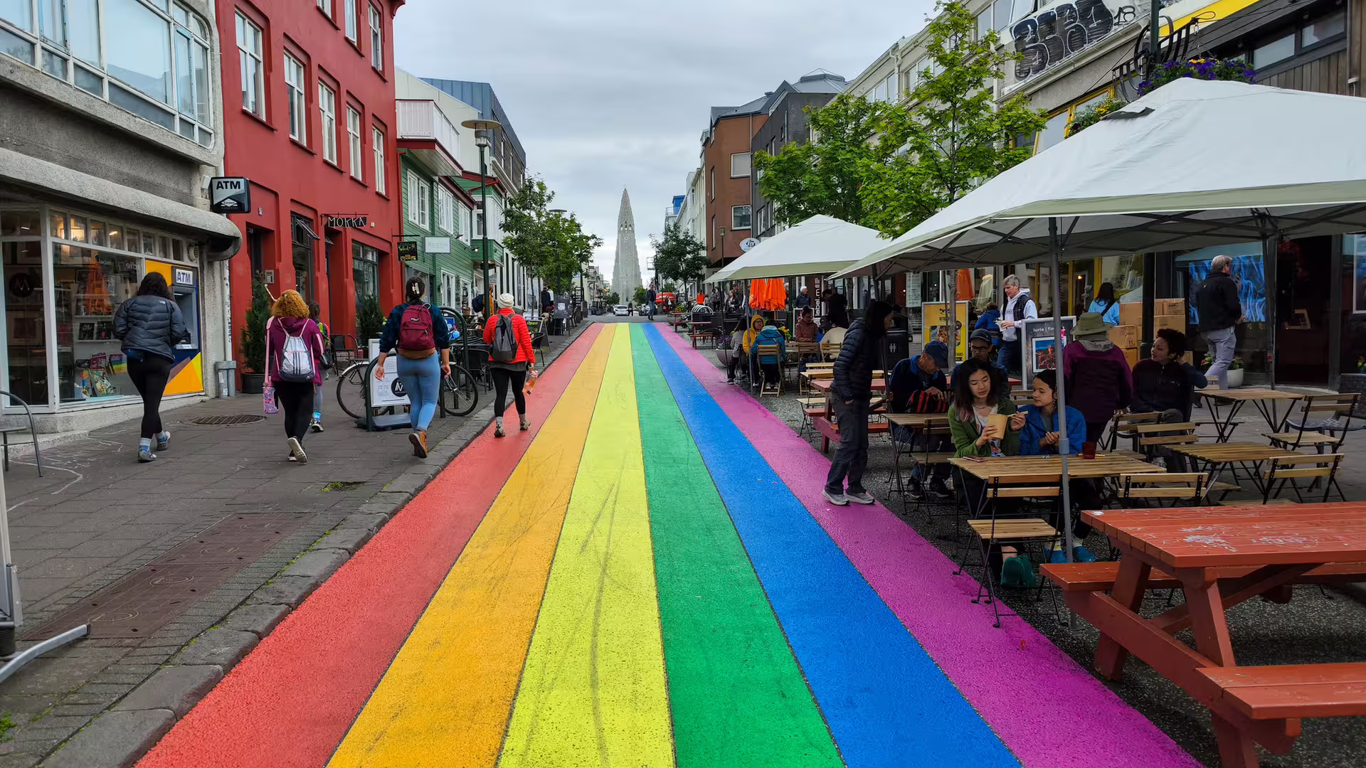 Rainbow street on Skólavörðustígur leading to Hallgrímskirkja church in Reykjavik Iceland