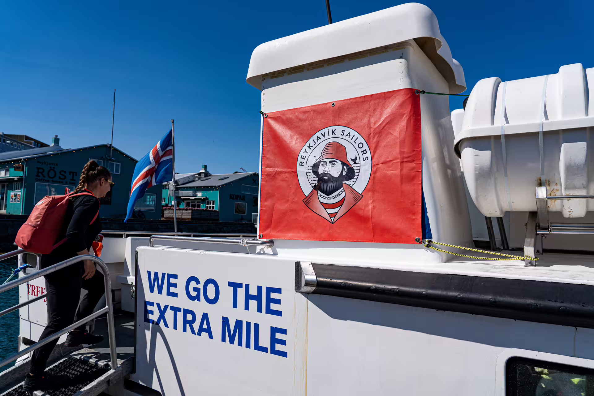 Reykjavik Sailors whale watching boat at Old Harbour with Icelandic flag and red company banner