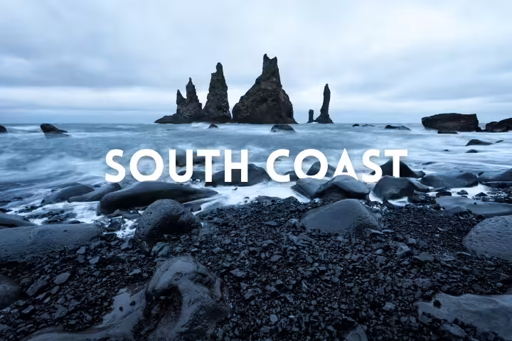 Reynisdrangar sea stacks at Reynisfjara black sand beach on Iceland private South Coast Classic tour
