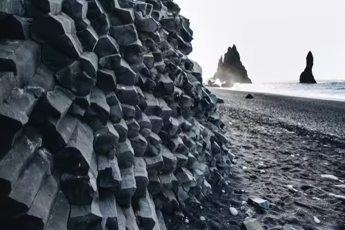 A picture of rock formations by Reynisfjara, the Black Beach.