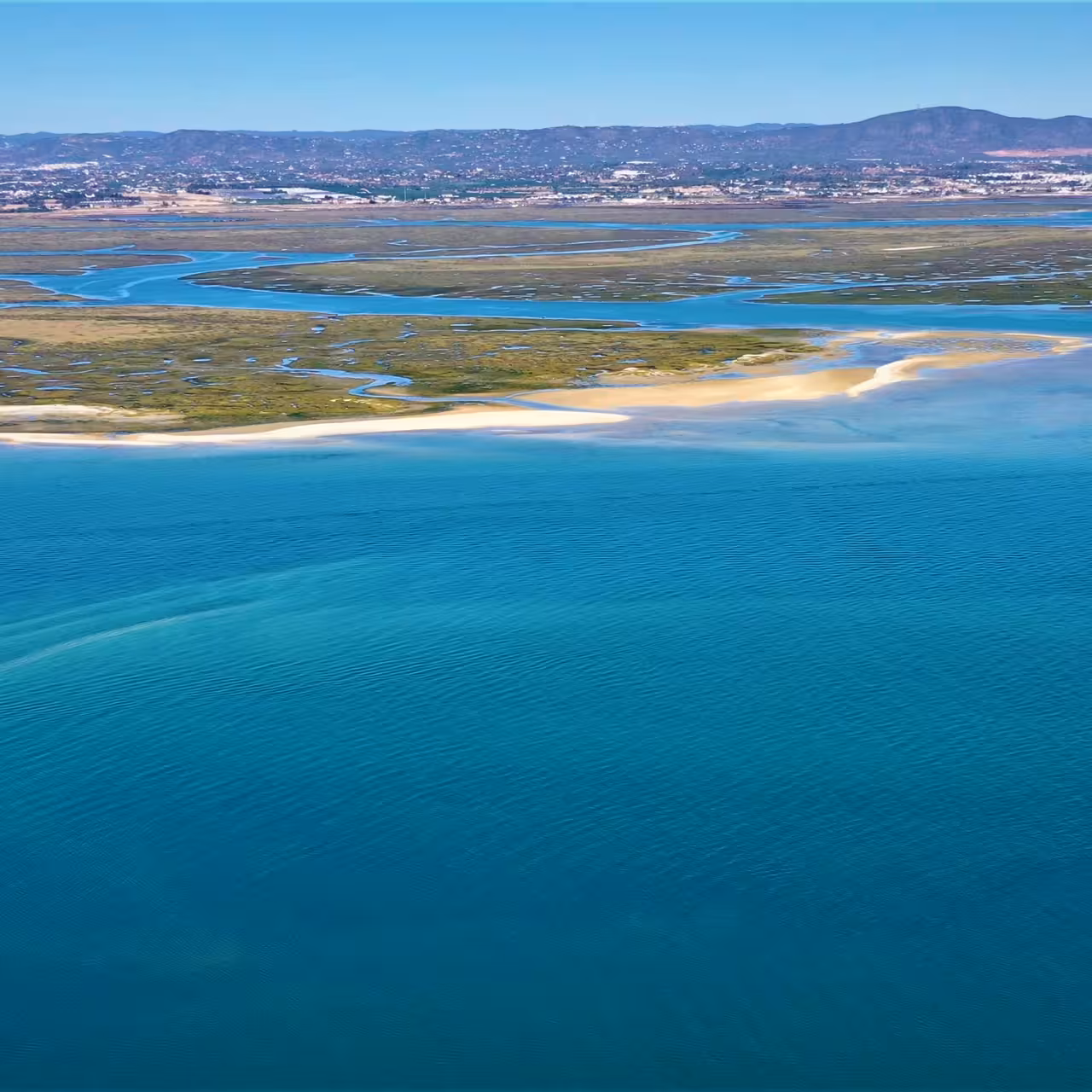 Aerial view of Ria Formosa lagoon channels and sandbanks near Faro, Algarve, on a scenic 2-hour boat tour