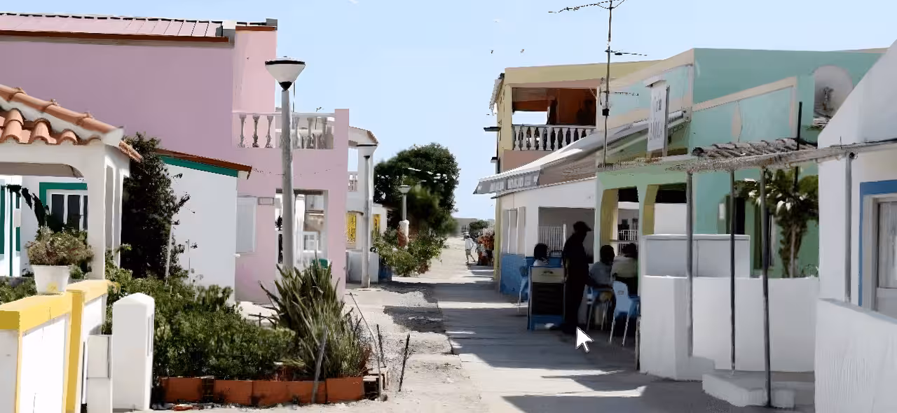 Colorful island village street on Culatra during Ria Formosa boat tour, Algarve 4 stops and 3 islands