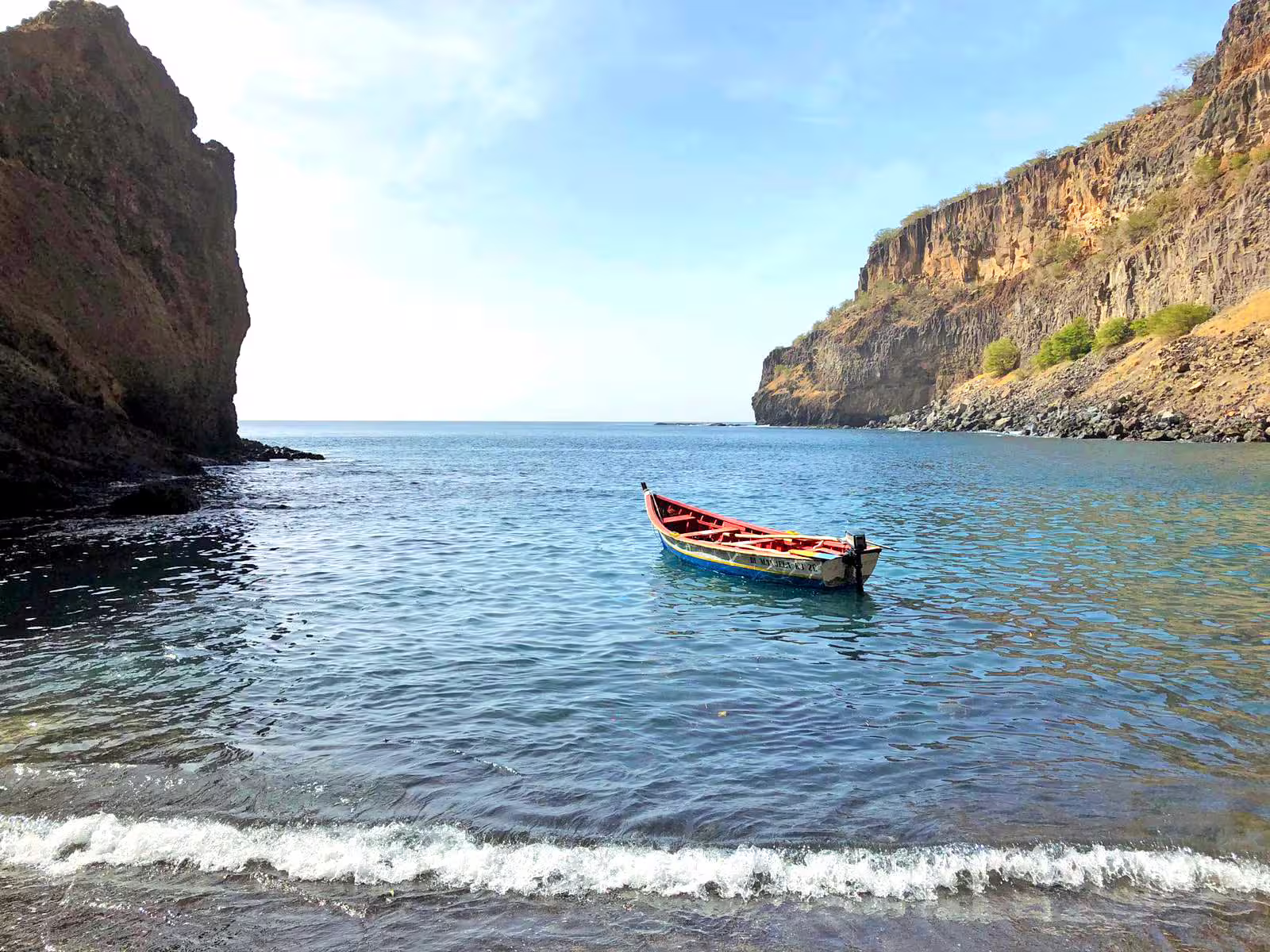 Ribeira da Barca boat trip with local fishermen boats cruising past palm-lined coast and volcanic mountains
