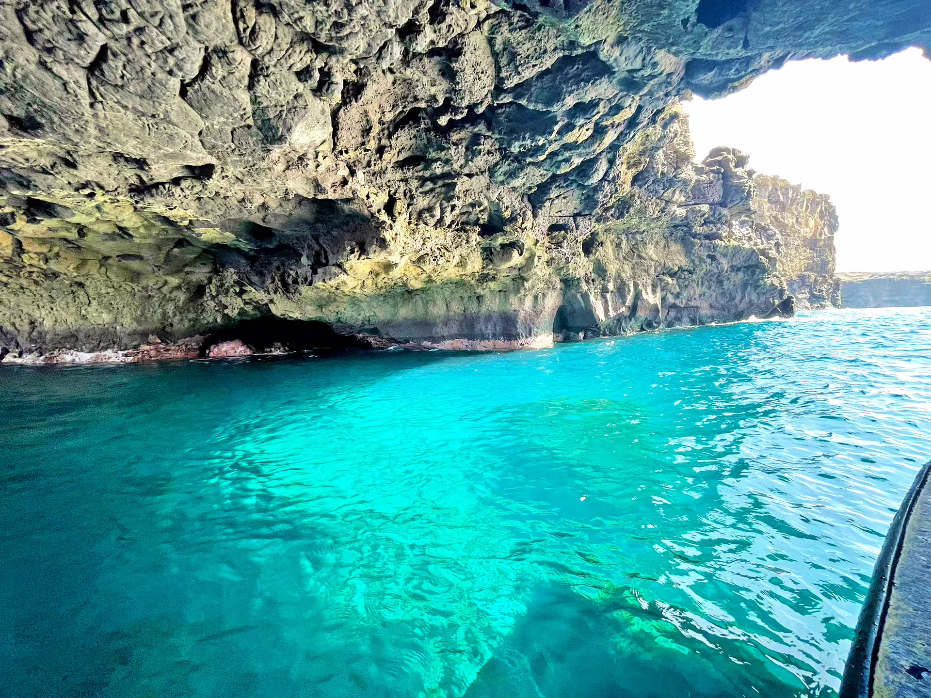 Turquoise water inside a sea cave near Ribeira da Barca, Cape Verde, on boat trip with snorkeling and BBQ