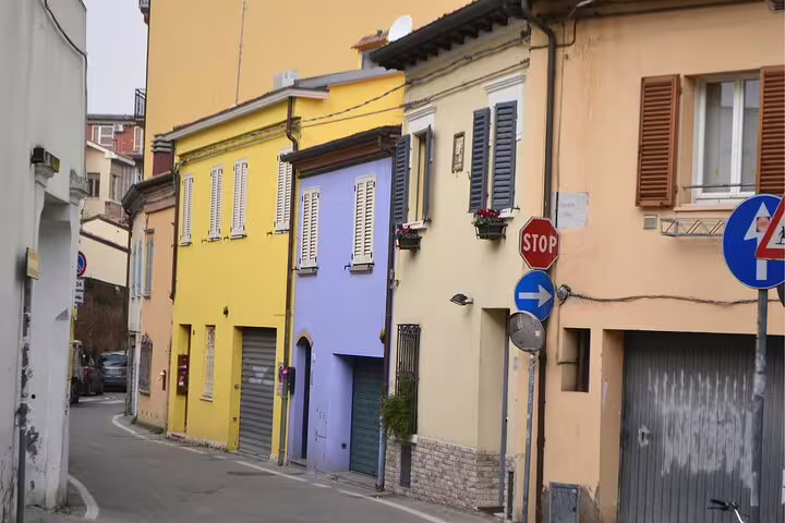 Colorful old town street in Rimini, Italy, ideal stop on a self-guided scavenger hunt highlights tour