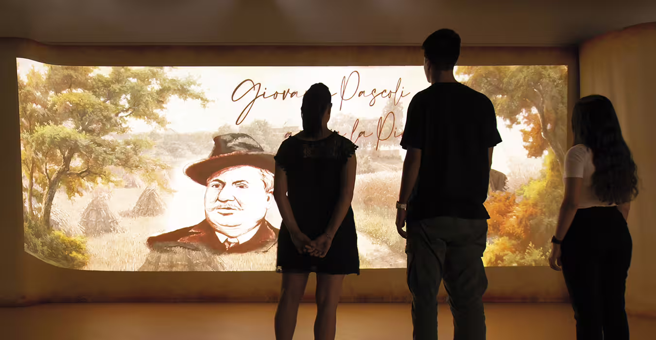 Visitors viewing an immersive exhibit at Rimini’s first Piadina Museum, exploring piadina history and culture