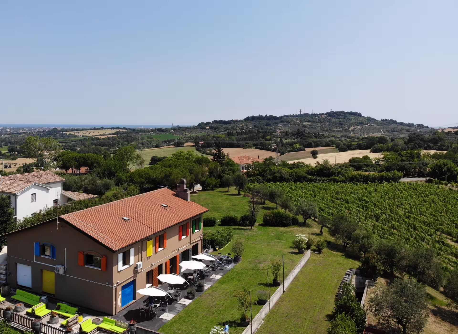 Rimini San Valentino DOC winery with vineyard views and tasting terrace in Emilia-Romagna countryside
