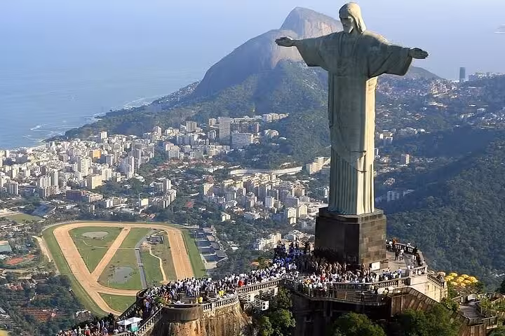 Aerial view of Christ the Redeemer overlooking Rio de Janeiro, a key highlight for travelers heading to Buzios.
