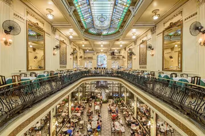 Elegant interior of a historic Rio cafe with stunning stained glass, a must-see on the downtown walking tour.