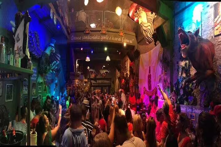 Colorful Rio nightclub packed with lively crowd enjoying samba rhythms and dynamic nightlife atmosphere.