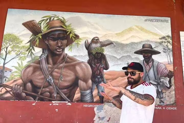 Vibrant Rio graffiti depicting historical figures, highlighting urban art on the Graffiti Tour.
