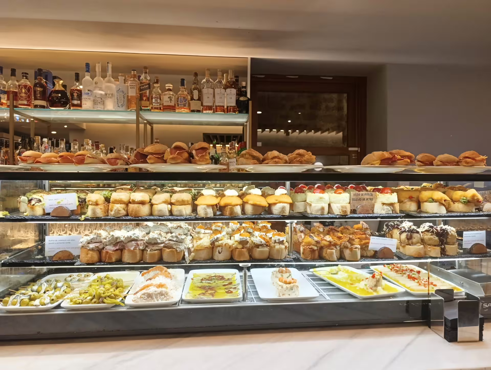 Gourmet tapas selection displayed in a Rioja bar, perfect for pairing with local wines on the Three Day Rioja Wine Experience.