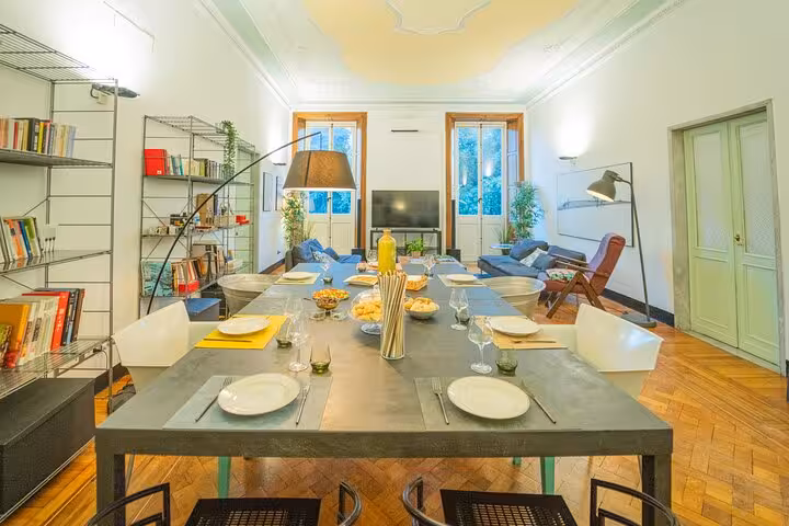 Elegant dining room with large table set for an exclusive Riviera oyster and seafood tasting experience.