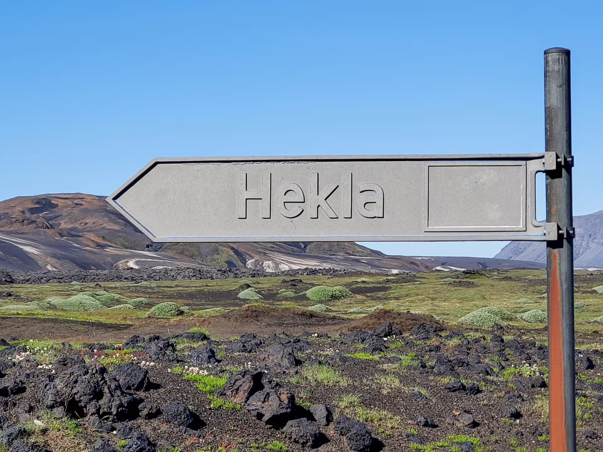Sandblasted sign to the Road to Hekla