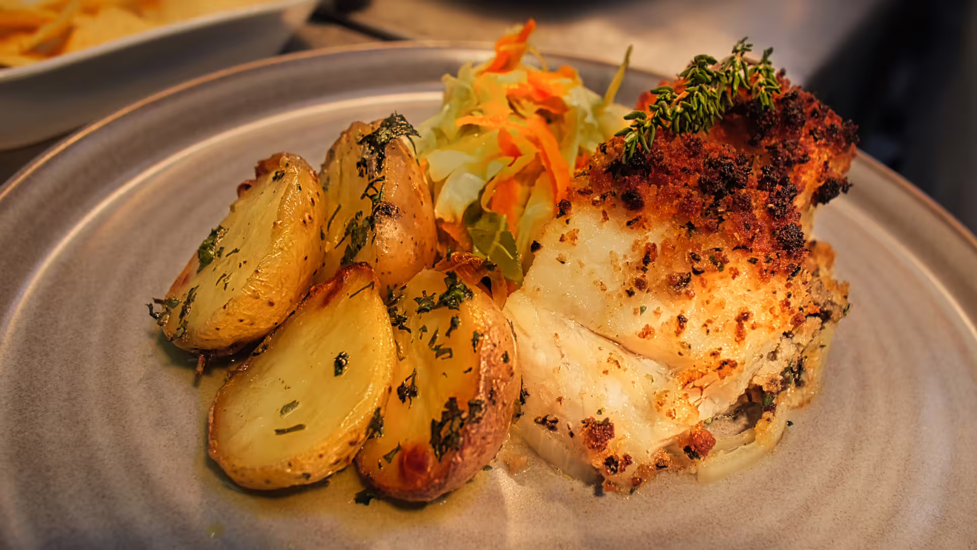 Image of Roasted Codfish with corn bread crust at our local restaurant in Porto, part of Cooltour Oporto's Fado Dinner Show