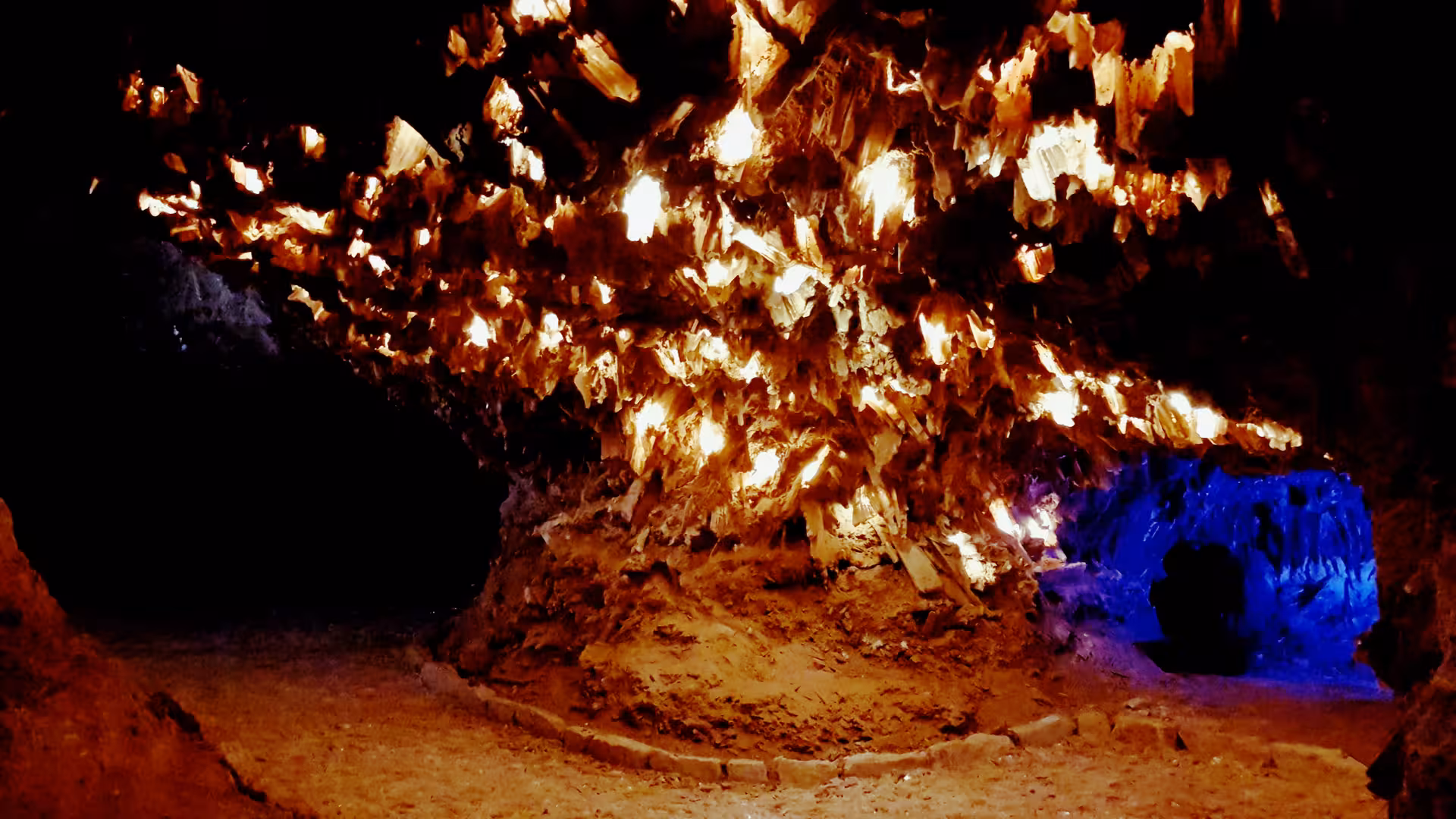 Glowing crystal chamber in Roman lapis specularis mine near Madrid, highlight of one-day Roman Empire tour