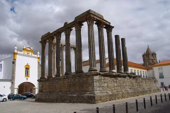 Ancient Roman Temple of Évora with towering columns, a highlight for private excursions in Évora, Portugal.