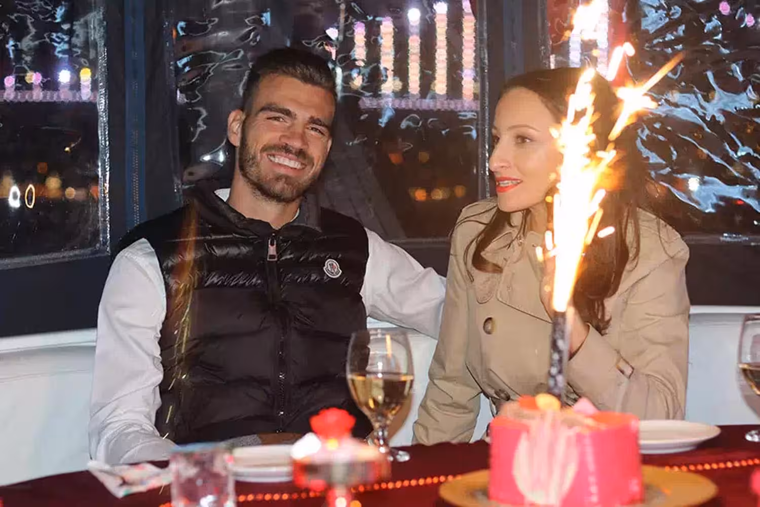 Romantic yacht dinner with cake and sparklers for a surprise marriage proposal, Istanbul Bosphorus night cruise