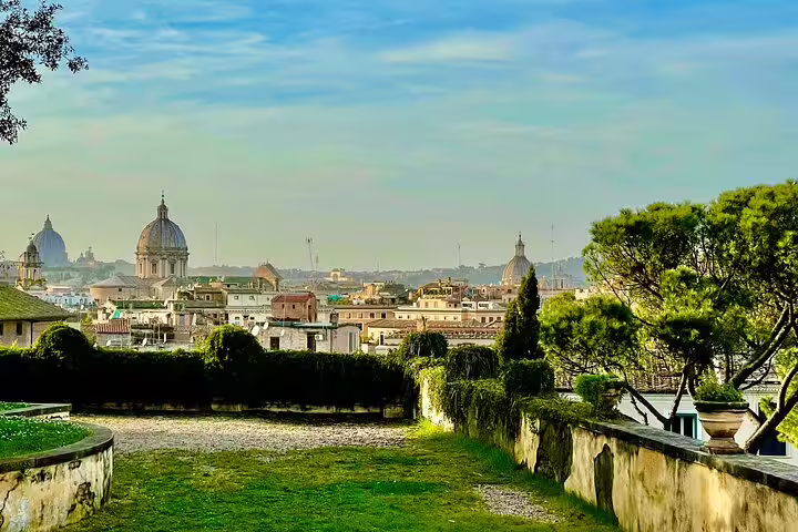 Panoramic view of Rome domes and skyline from Palatine Hill garden on Colosseum, Roman Forum and Palatine viewpoints tour